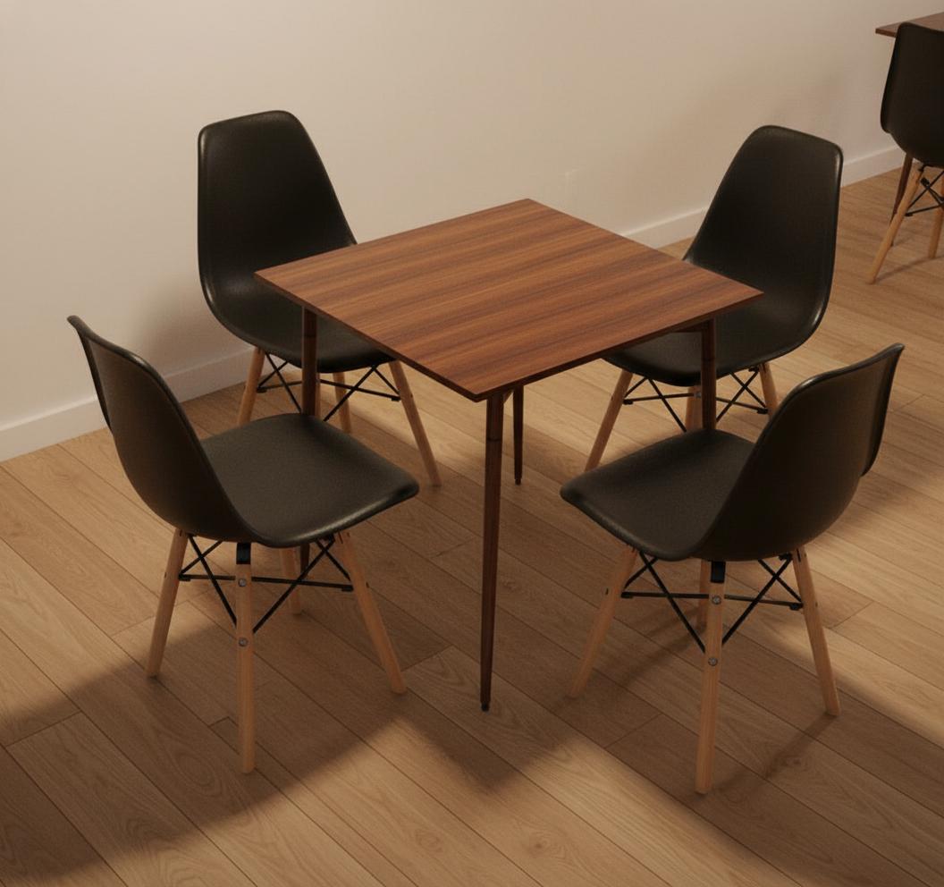 An incredibly lifelike, richly detailed, interior photo of a cozy vintage dining nook set within a charming restaurant, likely from the 1960s, given the mid-century modern furniture arrangement. The scene is illuminated by warm, diffused lighting, perhaps from pendant lamps not visible in the frame, creating an inviting and intimate atmosphere. Captured with a wide-angle lens, emphasizing the simple elegance of the space, the shot showcases a dark wood-grained square table perfectly centered, surrounded by four iconic black molded plastic chairs. The chairs feature a crosshatch of thin wooden dowels and black metal supports, resting on tapered wooden legs that echo the warmth of the tabletop. The chairs' smooth, ergonomic design contrasts beautifully with the textured grain of the wood. Subtle shadows are cast beneath the table and chairs, adding depth and grounding the furniture within an implied, unseen floor space. The overall composition is balanced and inviting, trending on Pinterest for its timeless appeal and effortless vintage charm, suggesting a place where one could comfortably linger over a meal.