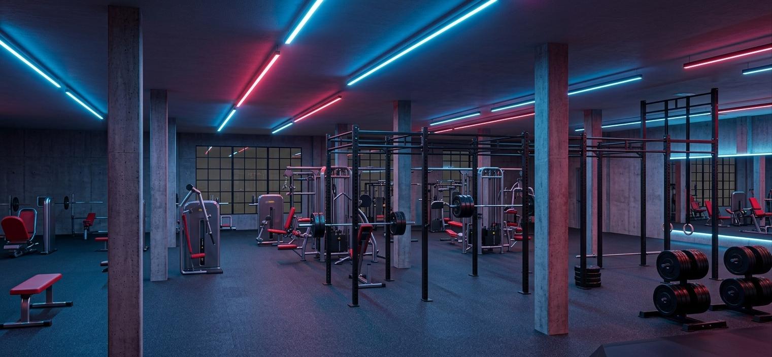 An incredibly lifelike, richly detailed, photorealistic wide-angle interior shot of a high-end fitness gym set in a modern urban facility. The scene is illuminated by sleek, pendant linear RGBW lighting that washes the room in vibrant neon hues of electric blue and crimson, creating a dynamic and energetic atmosphere. Captured with a 24mm architectural lens, emphasizing the tactile grain of the massive raw concrete pillars and the non-slip texture of the dark grey rubber flooring. The gym features a cyber eclectic fusion aesthetic, where cold, industrial elements meet futuristic technology; a massive matte black steel functional trainer and multi-station squat rig anchor the center of the space, surrounded by professional-grade cable machines with bold red upholstery and chrome accents. Subtle reflections of the colored LED strips dance across the polished weight plates and the smooth surfaces of the exercise benches, while the deep, moody shadows between the structural columns add a sense of cinematic depth and high-intensity purpose to the cavernous environment.