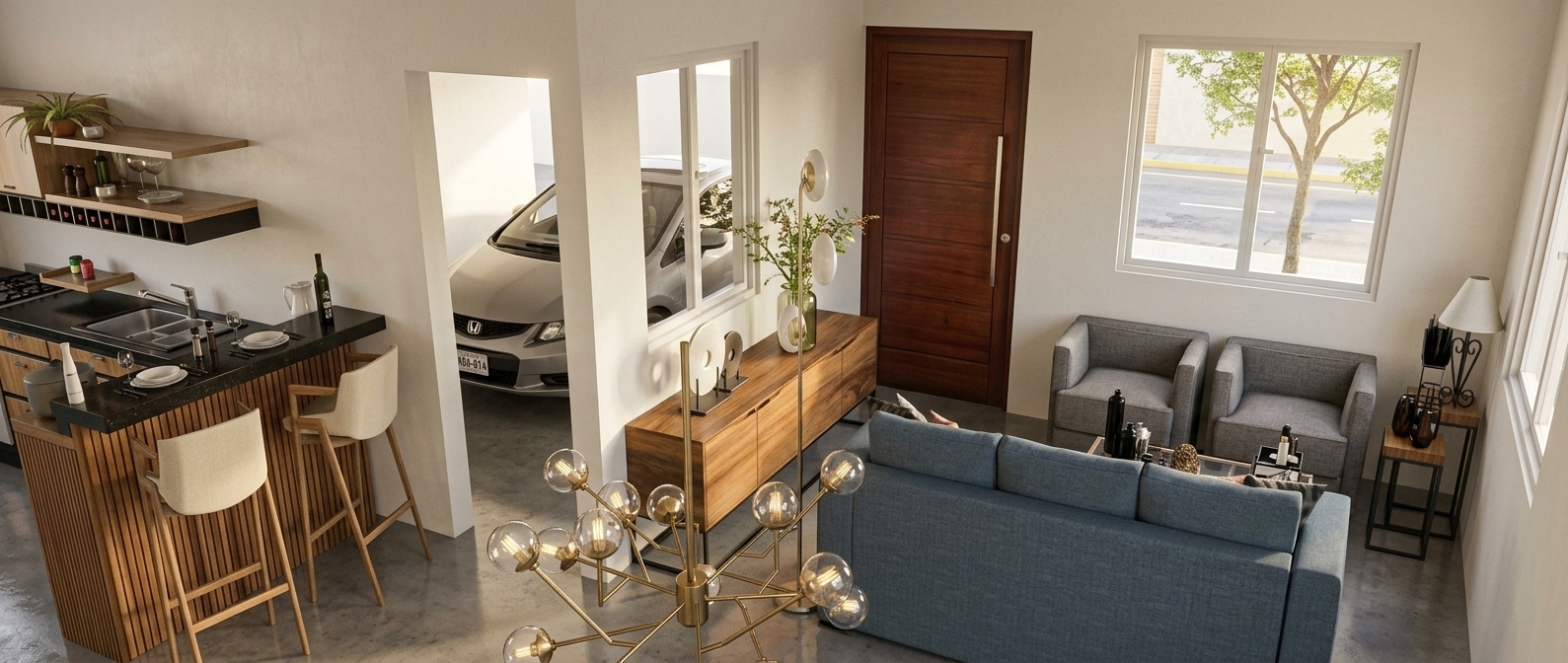 A high-end architectural photograph of a modern, open-concept home interior during a bright, warm summer midday. Intense, direct sunlight streams through the glass windows, casting crisp, defined shadows on the seamless polished concrete floor and bringing out the fine grain of the off-white plaster walls. In the foreground, a multi-bulb brass chandelier with glowing glass globes catches the light, while a textured blue fabric sofa and two gray upholstered armchairs anchor the living space to the right. To the left, a kitchen island with a slatted warm-wood base and a black countertop displays realistic domestic objects, flanked by two elegant bar stools with cream seats. In the background open doorway, a silver car is visible in the garage with realistic paint reflections. Beside the rich teak-wood front door, a dark wood console table holds delicate ceramic accessories and a glass vase with fresh stems. The camera captures the scene with a professional wide-angle lens, rendering tactile textures on the fabrics, natural wood grains, realistic glass reflections, and subtle imperfections like dust on surfaces and faint lens flare from the intense outdoor light, ensuring an authentic, beautifully photographed image.