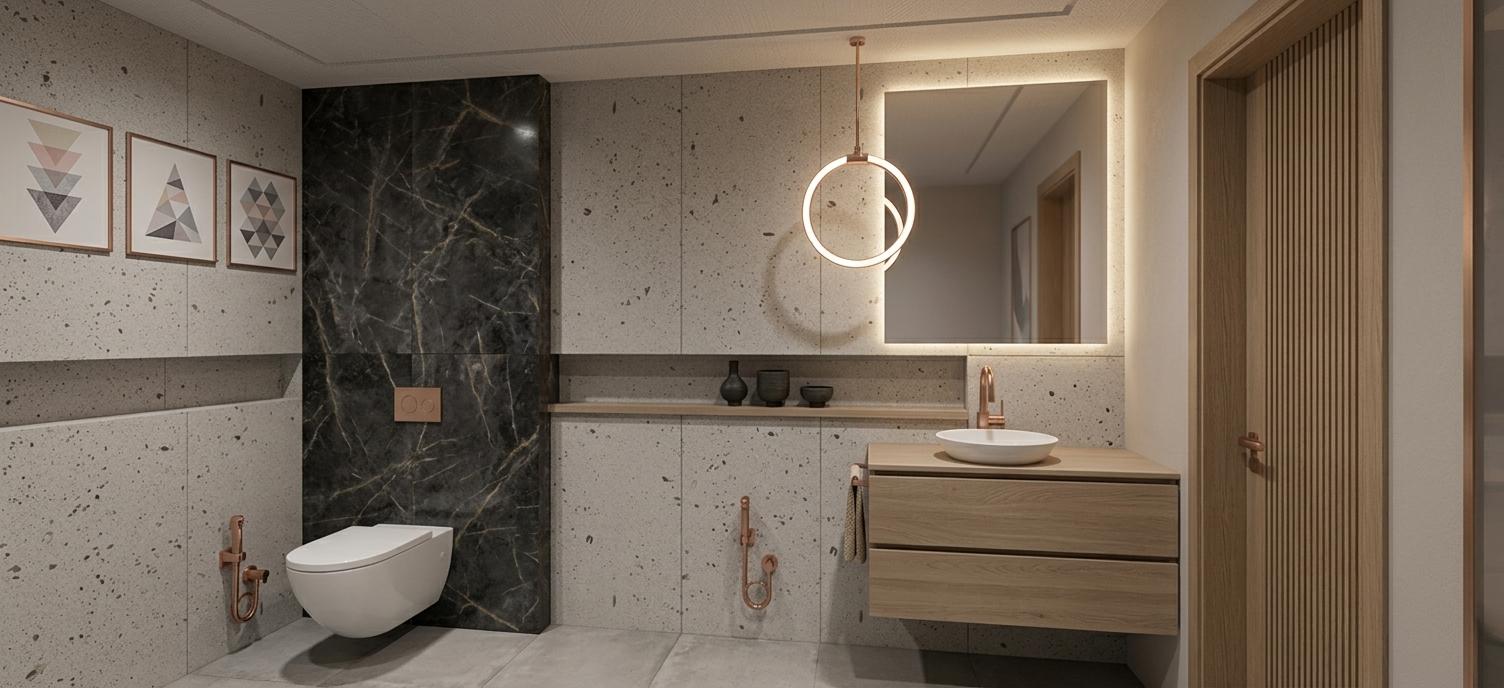 An incredibly lifelike, richly detailed, photorealistic wide-angle interior photo of a minimalist bathroom set in a contemporary apartment during a peaceful spring night. The scene is illuminated by the warm, atmospheric glow of a suspended ring pendant light and soft backlighting from a square vanity mirror, creating a serene, zen-inspired, and deeply calming atmosphere. Captured with a professional 50mm lens, emphasizing the matte terrazzo textures of the light-colored wall panels, the deep, luxurious veining of the dark marble accent wall behind the sleek wall-hung toilet, and the elegant rose-gold metallic finishes of the wall-mounted plumbing fixtures. On the left wall, three framed abstract art prints featuring geometric patterns in gentle pastel shades and muted grays introduce a subtle artistic touch to the uncluttered space. A floating wooden vanity in a soft beige tone with two clean-lined drawers supports a pristine white ceramic vessel sink, accented with a sleek chrome faucet. This minimalist haven prioritizes function and elegance, displaying clutter-free surfaces with only a few simple, dark ceramic vessels placed meticulously along a recessed shelf, emphasizing a highly sophisticated, streamlined layout that feels like a quiet sanctuary.