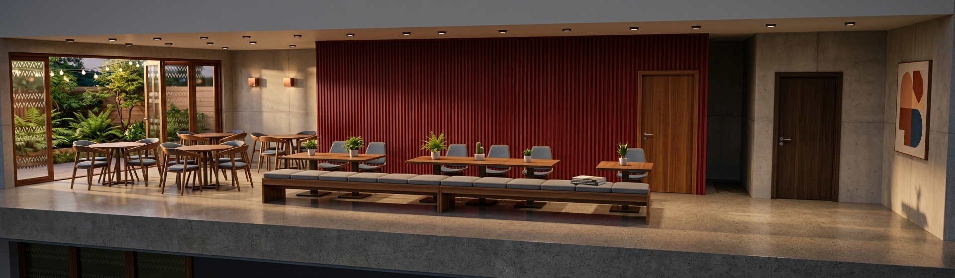 An incredibly lifelike, richly detailed, photorealistic wide-angle interior photo of a sleek, mid-century modern workshop and cafe space set in a sophisticated urban district. The scene is illuminated by warm, dramatic evening light casting long, soft shadows across the room, creating an inviting, timelessly creative atmosphere. Captured with a professional 35mm lens, emphasizing the rich vertical texture of the deep crimson-red ribbed wooden feature wall, the organic grains of polished teak and walnut furniture, and the soft sheen of concrete floors. 

Along the central feature wall, a custom teak banquette is topped with comfortable gray linen cushions, facing minimalist walnut-topped tables paired with iconic chairs upholstered in muted blues. Clutter-free surfaces are adorned only with potted indoor plants and a casually placed photography book. To the left, wooden-framed folding glass doors reveal a lush outdoor space, while the clean, functional concrete walls on the right feature abstract wall art incorporating earthy terracotta, orange, and blue tones, perfectly capturing a retro, sophisticated aesthetic.