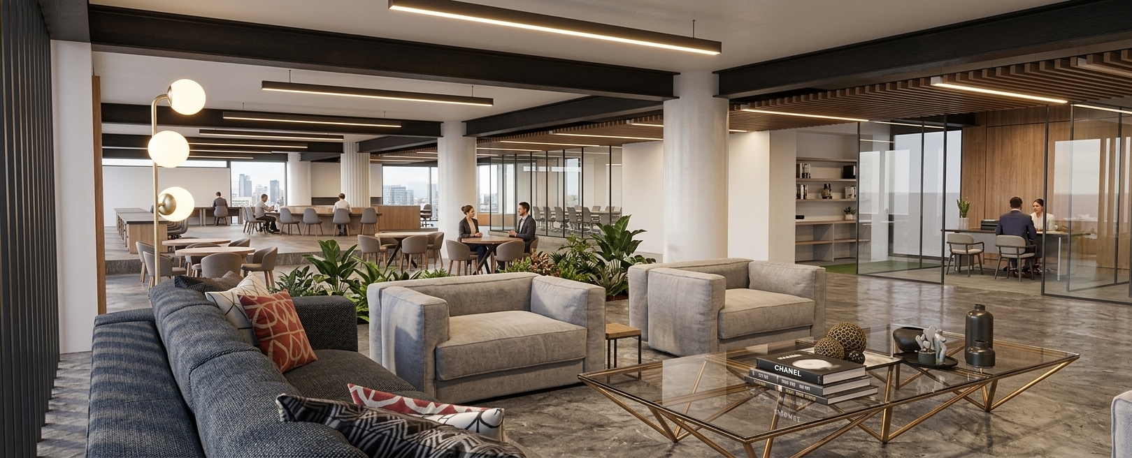 A wide-angle architectural photograph captures this expansive modern lounge and co-working space from the exact eye-level perspective, rendered with rich realism and atmospheric depth. In the foreground, tactile dark grey fabric on the sectional sofa and light grey woven upholstery on the soft armchairs reveal authentic weave micro-textures, complemented by decorative throw pillows with subtle red and dark geometric patterns. Dual geometric brass-framed glass coffee tables display neat stacks of art books, dark ceramic vases, and small decorative bowls reflecting soft overhead lights. Stylishly dressed people are seated naturally throughout the scene: figures engaged in conversation on the lounge seating, individuals working on laptops and chatting at each of the round wooden tables, people seated at the distant background workstations, and a few people captured mid-stride walking along the central hallway path. Lush green foliage and potted plants fill the internal planter recesses, adding fresh organic color. Overhead, dark structural ceiling beams and slatted timber panels feature integrated warm 2700K LED strip lights and recessed downlights that cast a cozy, gentle glow across the polished grey stone floor. Balanced daylight from large glass windows blends harmoniously with warm ambient fixture lights, capturing smooth highlight roll-offs, subtle reflections on glass partitions, realistic depth of field, and fine grain in the gentle shadows.