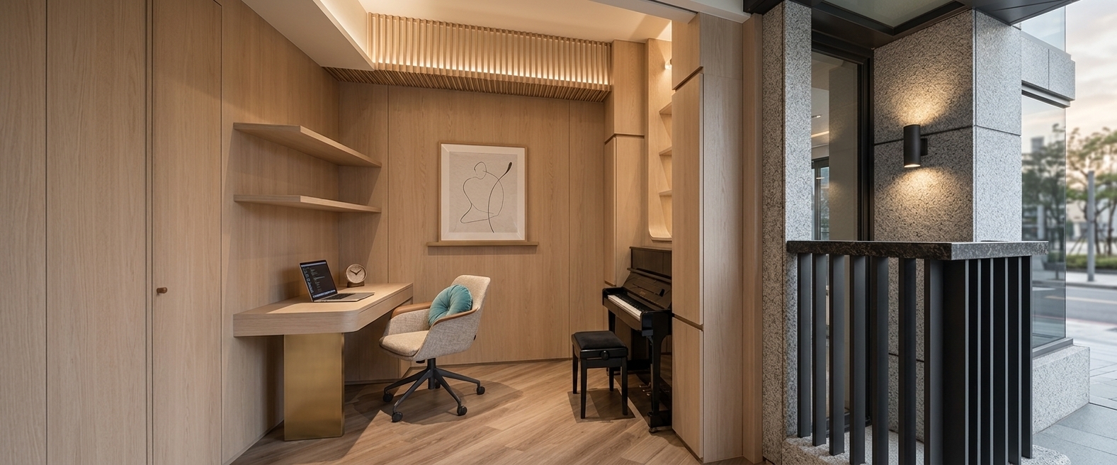 A professional, photorealistic architectural interior photograph capturing the exact room layout and composition shown in the image, rendered with natural physical lighting and realistic material finishes. Soft daylight streams gently into the space, illuminating the light blonde wood wall paneling and slatted ceiling detail with warm tone-on-tone reflections, while casting soft, diffused ambient occlusion shadows beneath floating shelves, under the desk, and around the black upright piano. The light oak floorboards exhibit subtle natural grain variations with a soft matte luster. The brushed brass base of the desk gleams with a realistic metallic finish, catching subtle specular highlights, while the laptop screen casts a gentle glow onto the smooth desk surface. The upholstered office chair features a fine woven fabric texture beside the black lacquer piano, which shows soft, realistic reflections on its satin finish. To the right, the textured grey granite pillar displays authentic speckled stone micro-relief alongside the dark metal railing topped with a dark polished marble cap. Shot on a wide-angle architectural prime lens with crystal-clear focus, neutral color temperature, subtle depth of field, and imperceptible grain, delivering an immaculate, beautifully lit photograph true to the original reference.