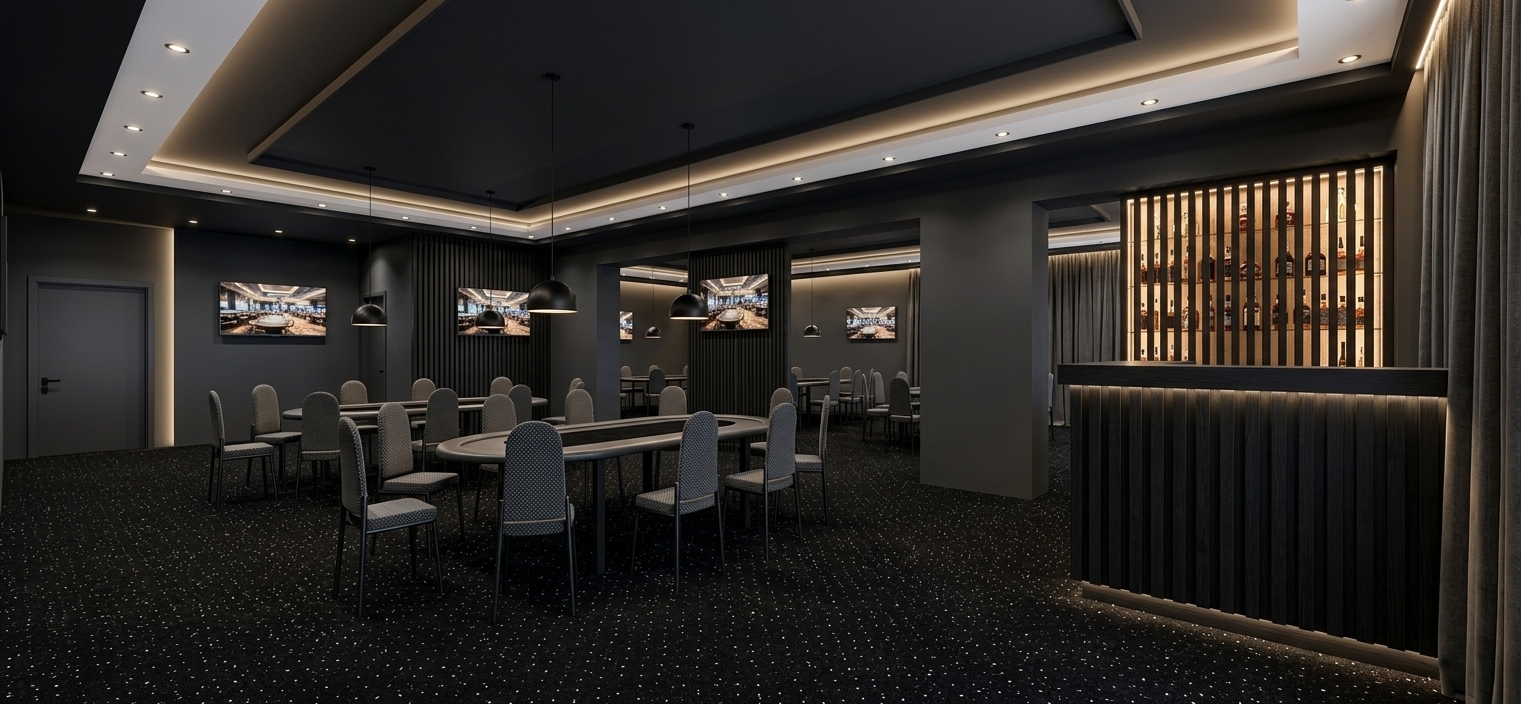 An incredibly lifelike, richly detailed, photorealistic wide-angle interior photograph of a modern lounge and meeting room set in a luxury contemporary venue. The scene is illuminated by a ambient mix of warm, bright artificial light from embedded white ceiling spotlights, soft concealed cove lighting, and matte black dome pendant lamps suspended low over the tables, creating a moody, upscale contemporary elegance atmosphere. Captured with a 24mm architectural tilt-shift lens, emphasizing rich charcoal textures, subtle velvet sheens, and clean geometric lines. Deep anthracite-colored walls envelop the space, contrasting with a sophisticated multi-level ceiling composed of a central dark anthracite recess, an elevated white perimeter tier inset with crisp white recessed spotlights, and a lower anthracite soffit margin. Underfoot, plush black carpeting sprinkled with small white speckles stretches across the room, providing a base for refined oval grey tables accented with rich black velvet tabletop centers. Matching modern chairs featuring dark grey fabric with fine dotted patterns and slim black legs are neatly arranged around the tables. To the right, a custom black slatted bar counter shines with under-counter LED strips, positioned before a liquor showcase with a brightly glowing, backlit background that illuminates neatly arranged rows of glass bottles. Vertical black wooden slat partitions elegantly divide the space, while wall-mounted flatscreen monitors display dynamic views of a gaming hall, and floor-to-ceiling anthracite curtains along the perimeter are softly washed in light from hidden ceiling cove illumination.