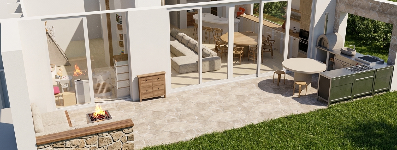 High-end architectural photograph of the indoor-outdoor patio captured in bright summer midday sunlight. Crisp overhead lighting casts defined natural shadows across the textured flagstone patio and adjacent green lawn, strictly preserving the original geometry and layout. Realistic glass reflections and natural daylight illuminate the interior living spaces through the sliding doors. Surfaces feature authentic tactile finishes, from the matte stone flooring and masonry pizza oven to the outdoor kitchen and dynamic firepit flame, captured with sharp architectural optics, balanced exposure, and true-to-life summer color tones.