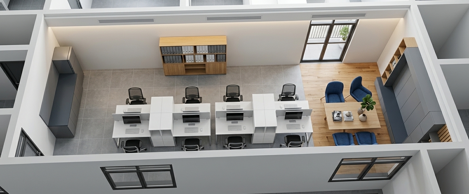 An incredibly lifelike, richly detailed, photorealistic elevated perspective of a minimalist open-plan office interior set in a sleek contemporary commercial suite. The scene is illuminated by soft, diffused daylight pouring through generous glass doorways and windows, perfectly balanced by warm, concealed ambient lighting that creates a serene, tranquil, and uncluttered atmosphere. Captured with a crisp wide-angle architectural lens, emphasizing the fine contrast of polished materials, tactile wood grains, and matte finishes. Across the spacious layout, streamlined white modular workstations with slender metal framing feature immaculate, clutter-free setups with slim monitors and ergonomic mesh task chairs arranged over pristine cool-gray tiled flooring. A central blonde oak storage bookcase is neatly styled with uniform monochromatic binders, while the adjacent kitchenette displays minimalist cabinetry crowned with deep slate-gray countertops and a brushed stainless steel refrigerator. Transitioning gracefully to warm natural hardwood plank flooring, an inviting breakout meeting nook features elegant, rich blue upholstered armchairs gathered around a refined wooden table adorned with curated photography books, minimalist ceramic decor, and a touch of lush indoor greenery, all harmonized by subtle shades of white, slate gray, and zen-inspired design elegance.