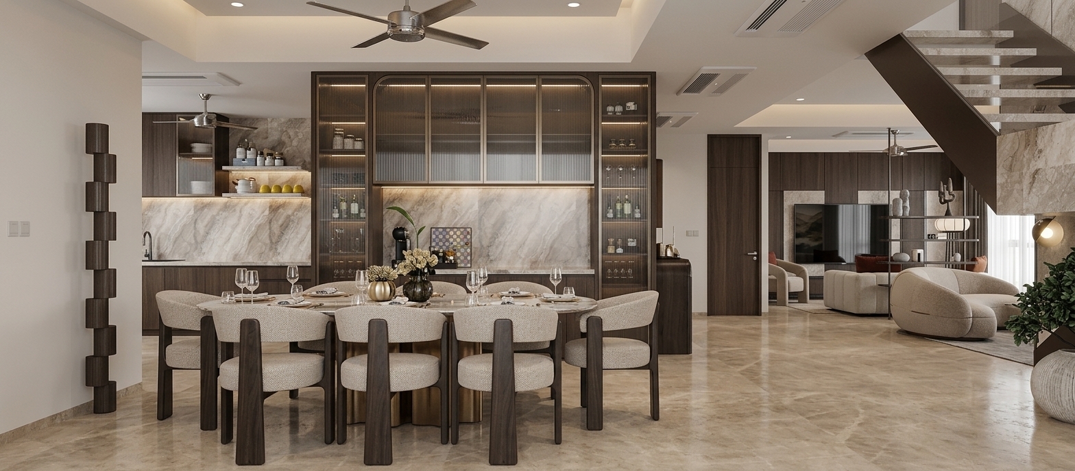 A photorealistic architectural photograph capturing the exact interior scene and layout, illuminated with warm recessed COB ceiling spotlights and subtle LED accent lighting within the display shelving and niches. The marble surfaces, wood cabinetry, and fabric dining chairs feature realistic micro-textures, soft reflections, and natural depth. Soft warm light pools accentuate the dining table and bar glassware, while gentle ambient illumination fills the background living area, captured cleanly on a wide-angle architectural lens with realistic dynamic range and natural shadows.