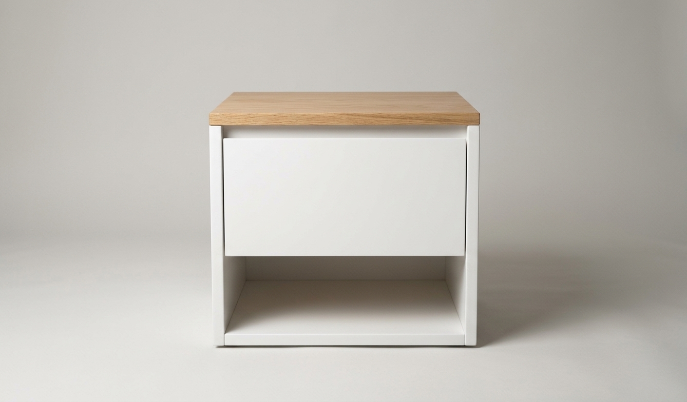 A photorealistic studio product photograph of the modern minimalist nightstand, preserving the exact straight-on framing and geometry. The top surface features genuine light natural oak wood with visible grain texture and a soft satin sheen, while the main frame and drawer face have a smooth, matte white lacquered finish with realistic seams and edges. Soft, diffused studio lighting creates natural ambient occlusion inside the open lower compartment and beneath the base against a seamless neutral grey studio backdrop, captured sharply with realistic photographic depth and balanced exposure.