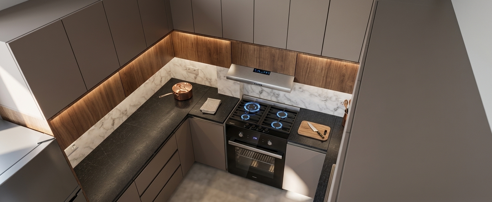 A high-angle architectural photograph of the modern kitchen captured in bright, natural midday spring sunlight. The scene preserves the exact layout, showcasing realistic matte greige and warm walnut wood cabinetry, a polished white marble backsplash with delicate grey veining, and textured dark charcoal countertops. Crisp, diffuse daylight casts soft contact shadows and subtle natural highlights across the black glass oven, cast-iron gas stovetop, and brushed metallic range hood. Authentic material textures, micro-reflections, balanced color temperature, and gentle camera grain deliver a crisp, believable interior photograph.