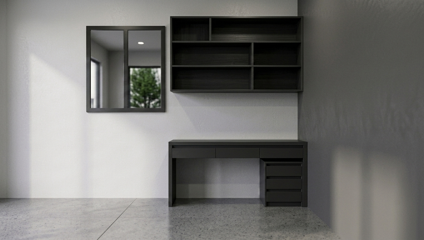 A photorealistic interior photograph preserving the exact room composition and geometry, rendered in richer, darker charcoal tones across the desk, shelving unit, and mirror frame. Soft, moody daylight streams from the left, casting natural shadows and gentle highlights across the polished stone floor. The shot features authentic photographic depth, fine surface micro-textures on the matte dark cabinetry, subtle ambient occlusion, and a hint of natural sensor grain.