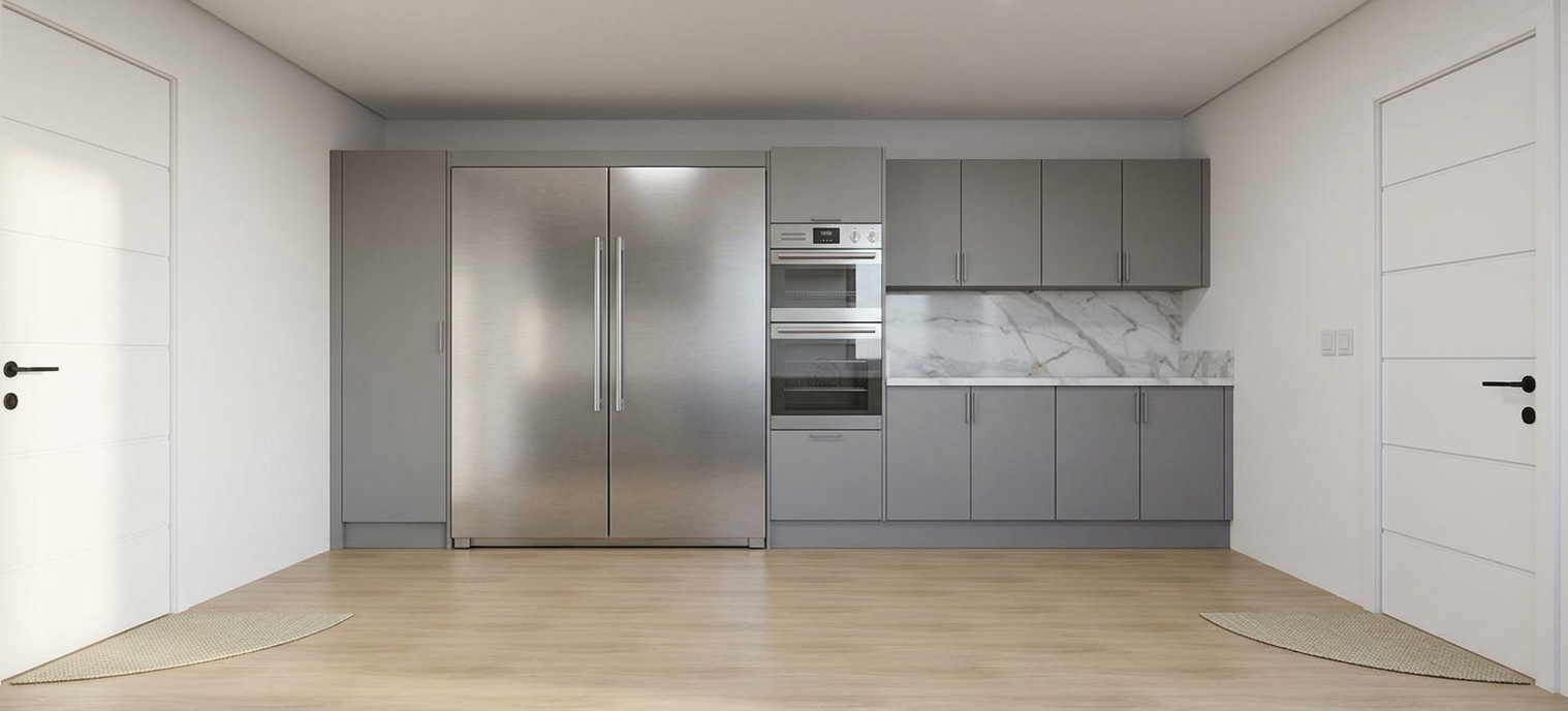 A straight-on, eye-level architectural photograph capturing this modern kitchen with absolute fidelity to its existing layout, featuring smooth matte gray cabinetry, sleek black toe kicks along the base, and brushed stainless steel appliances with subtle specular reflections. Soft, diffused ambient interior lighting balances with faint daylight, gently illuminating the white marble backsplash veining, polished white walls, and warm light-oak flooring. Photographed with a 35mm lens, sharp focus across the entire depth of field, natural contact shadows grounding the furniture, and subtle micro-textures on laminate and metallic surfaces to deliver an authentic, high-end interior photograph.