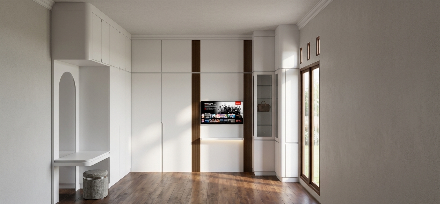 An architectural photograph of the interior illuminated by bright midday spring light flowing from the glass door on the right. The custom built-in cabinetry displays smooth matte-white surfaces, complemented by warm textured vertical fluting framing the recessed TV. Natural hardwood flooring reflects the daylight with a subtle satin sheen, while the desk niche, upholstered stool, and glass display cabinet show realistic surface textures and reflections. Captured with a sharp wide-angle lens, the scene features balanced neutral daylight, soft ambient shadows, and authentic physical material finishes, preserving the exact geometry and composition.