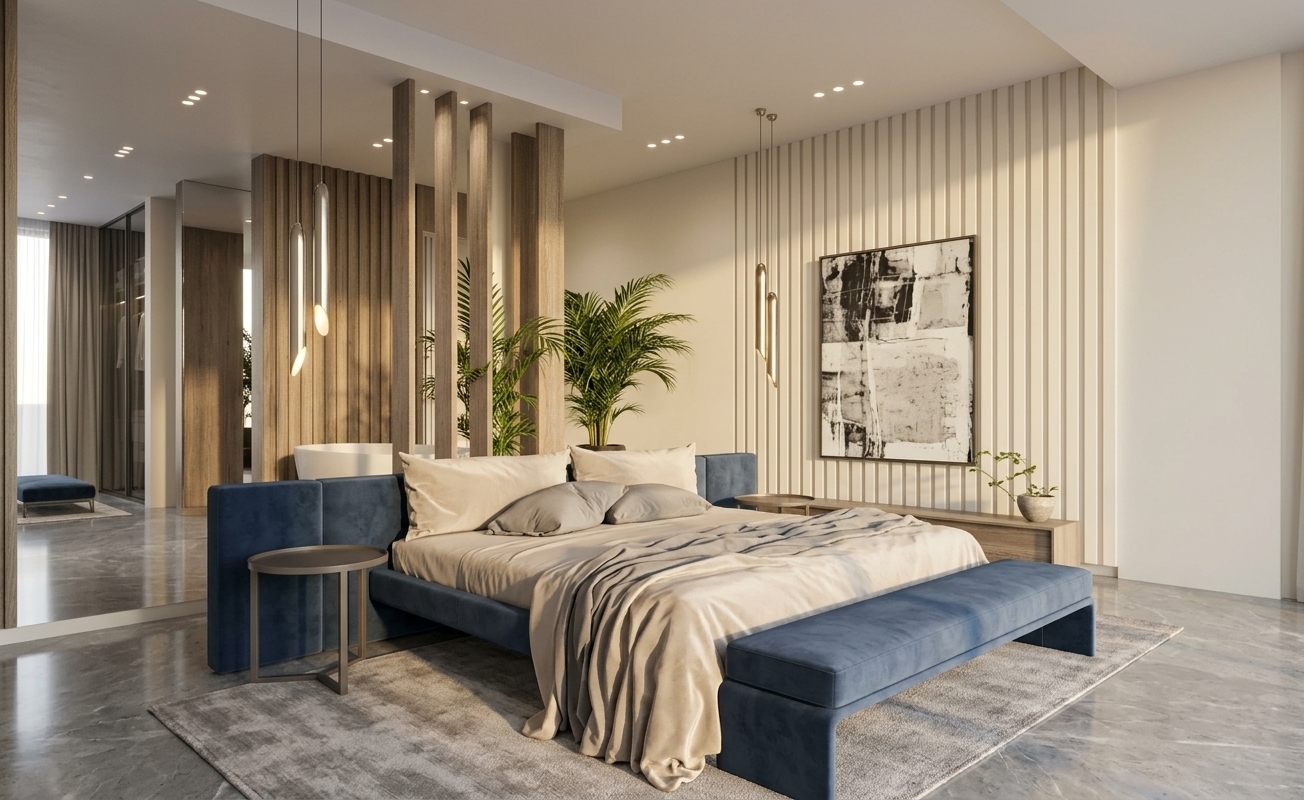 An incredibly lifelike, richly detailed, photorealistic wide-angle interior shot of a luxurious master bedroom set in a contemporary high-end penthouse. The scene is illuminated by the soft, golden radiance of an early sunrise casting long shadows alongside subtle recessed ceiling spotlights, creating a serene, airy, and sophisticated atmosphere. Captured with a professional 24mm tilt-shift architectural lens, emphasizing the contrast between plush velvet upholstery, delicate wood grain, and mirror-like reflections across polished gray stone floors. At the center sits a tailored, deep-blue upholstered platform bed draped in rumpled champagne and soft gray linens, paired with a matching cushioned bench and minimalist circular nightstands. Behind the bed, an elegant vertical-slatted accent wall finished in warm pearl white hosts a striking piece of abstract wall art, flanked by slim, sculptural metallic pendant lights. Vertical timber slats gracefully zone the sleeping area from the en-suite space, while a full-height mirrored wall amplifies the room's balanced, light-filled proportions and refined contemporary elegance.