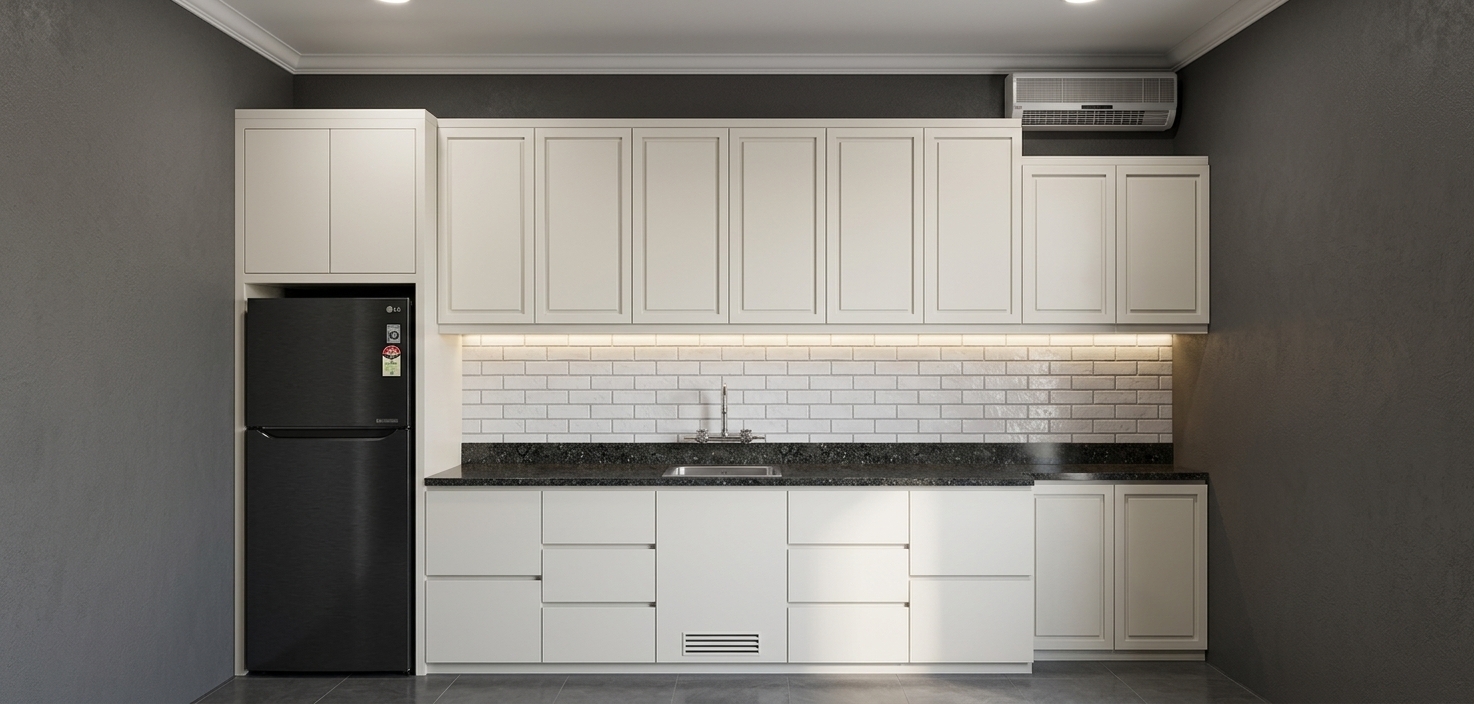 A straight-on, eye-level photograph of the modern kitchen illuminated by bright, clear midday spring daylight coming from an off-camera window, casting soft ambient shadows. The upper and lower white cabinetry display smooth satin paint textures with subtle sheen on recessed panel profiles, contrasting against the glossy white subway tile backsplash with fine grey grout lines. The dark polished granite countertops exhibit fine mineral speckles and crisp surface reflections of the chrome faucet and stainless steel sink. The black refrigerator shows realistic semi-gloss reflections and faint surface micro-textures, while the wall-mounted air conditioning unit, ceiling trim, and dark tiled floor ground the scene in believable, naturally lit domestic realism with subtle lens depth and minimal grain.