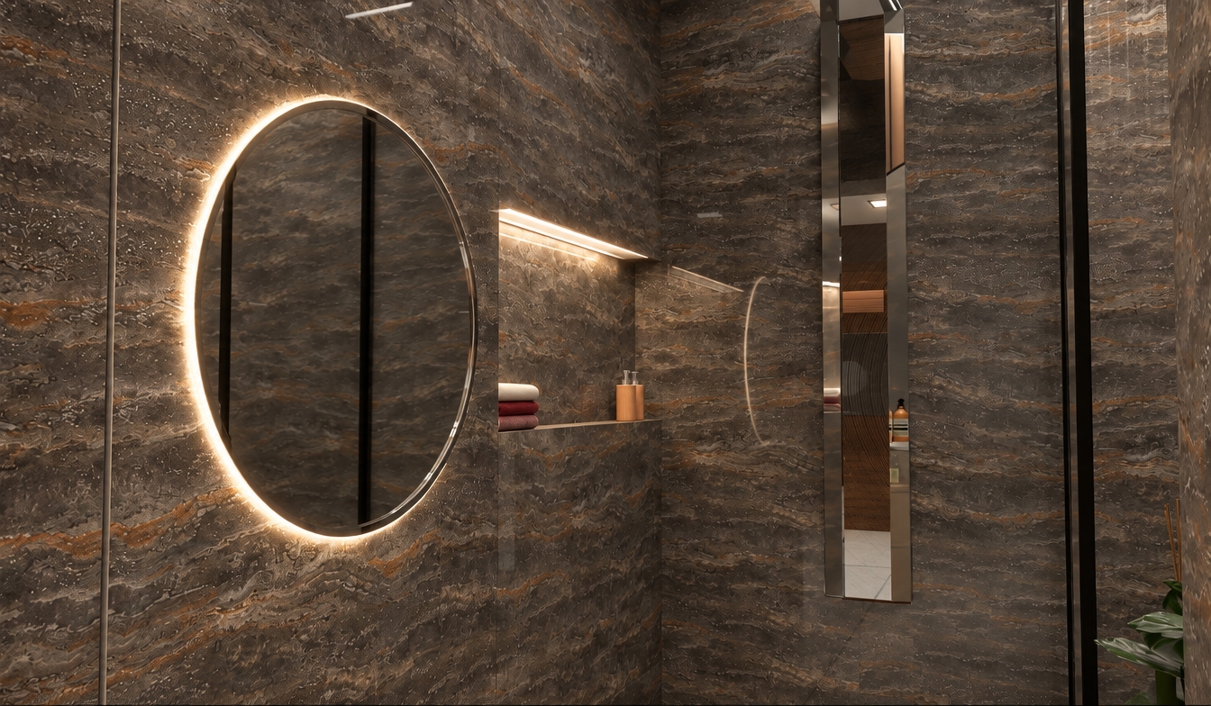Professional architectural photograph of the modern bathroom, captured with a 24mm lens at f/8 with crisp depth of field and natural dynamic range. The dark veined stone-effect ceramic tiles display tactile micro-texture and soft ambient sheen, illuminated by the balanced, diffuse glow of the circular mirror's halo backlighting and the recessed shelf LED strip. Reflections on the vertical chrome trim and glass shower partition exhibit realistic refraction and subtle surface imperfections. Soft light falloff naturally defines the toiletries and folded towels, preserving exact scene geometry with clean, authentic architectural photography finishes.