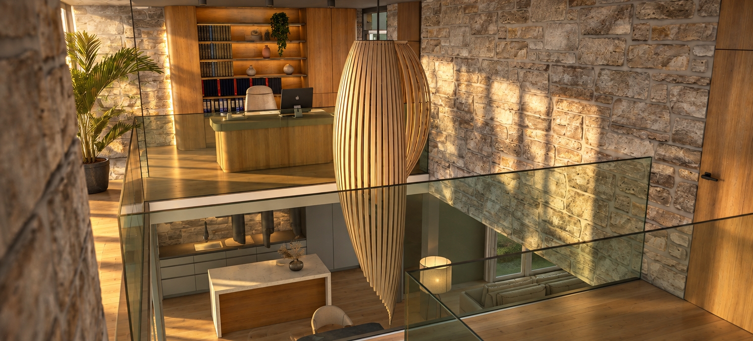 Architectural interior photograph of the exact scene bathed in early sunrise light. Low-angle golden sunlight cuts across the interior, casting long, soft shadows and highlighting the rugged masonry of the stone walls and fine grain on the wooden cabinetry and desk. The hanging slatted pendant catches warm edge illumination, while the glass railings display physically accurate transparency, faint reflections, and realistic edge refractions. Balanced exposure maintains soft ambient light across both the lower kitchen and upper office, complemented by natural surface micro-textures, subtle dust motes in the sunbeams, faint photographic grain, and gentle lens vignetting.